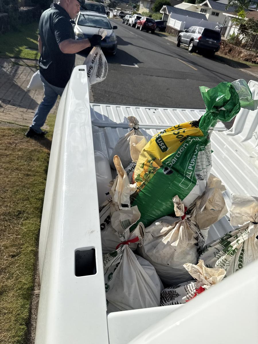 Loaded truck bed after junk removal job on Oahu